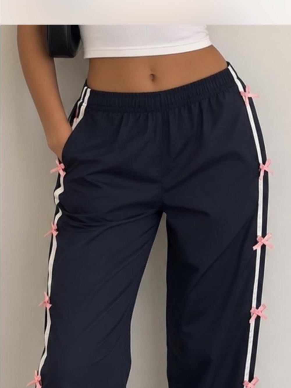 PacSun Black Track Joggers with White Stripes and Pink Bow Details